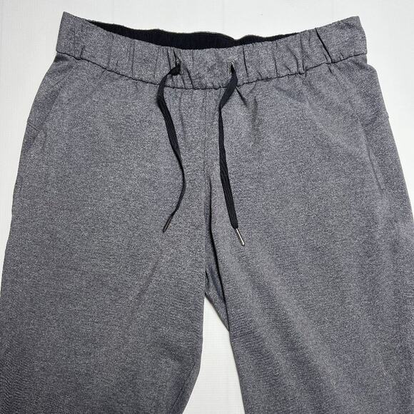 Lululemon On the Fly Crop Pants 23" SIZE 8 Heathered Black Travel Joggers - Picture 7 of 13